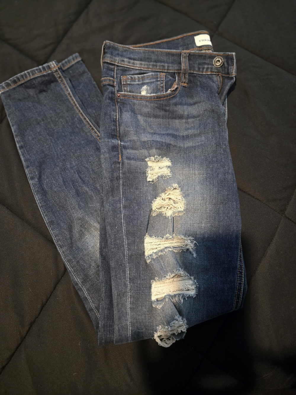 Sneak Peek Distressed Indigo Skinny Jeans